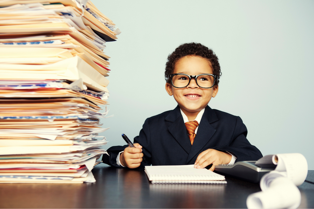 child doing paperwork