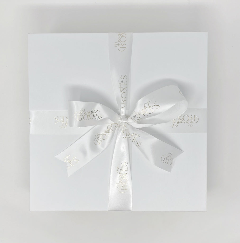 Magnetic white keepsake box made from recycled materials with Bright Boxes Ribbon