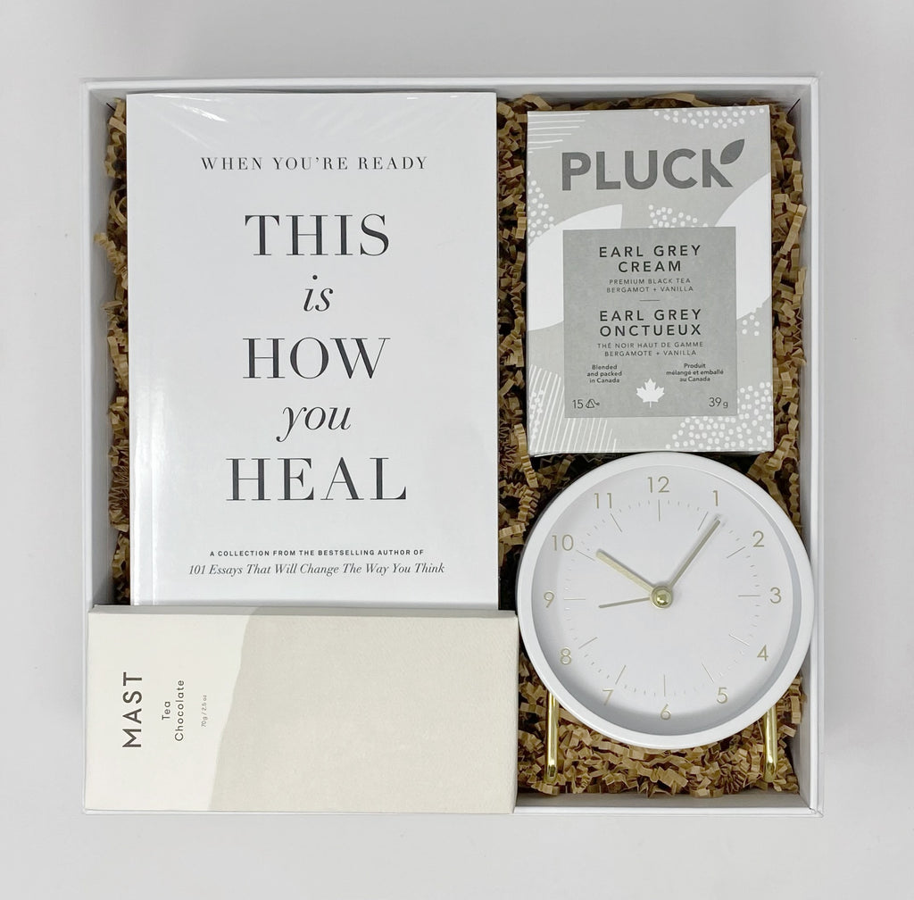 Take Time Gift Box, When You're Ready This is How You Will Heal book by Brianna Wiest, Pluck Earl Grey Cream Tea, Mast Tea Chocolate Bar & The Decent Living - Desk Clock - White & Gold